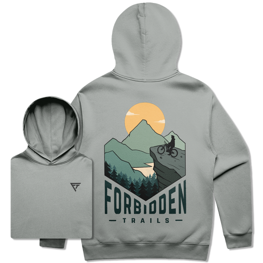 Gray hoodie with 'Forbidden Trails' graphic on back with mountain biker in the mountains
